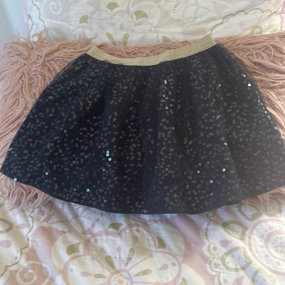 Oshkosh navy blue skirt size 7 with sequins and tule. Like new.